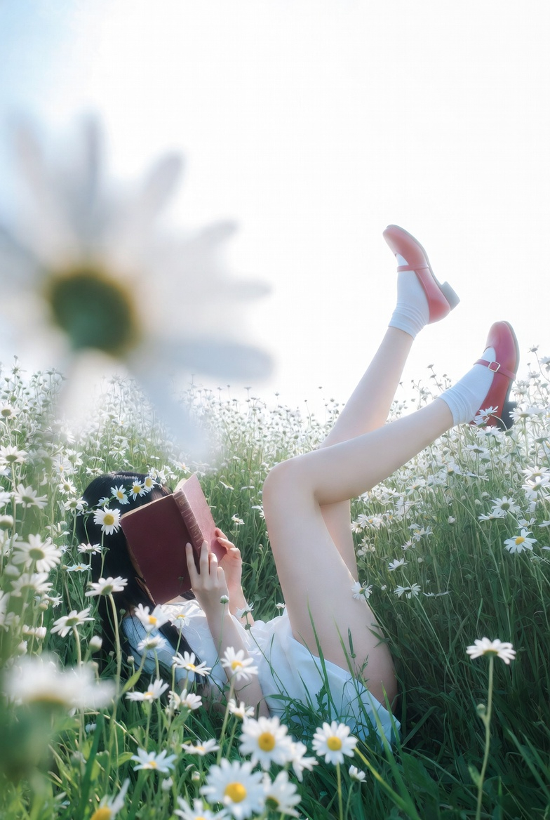 Dreamy Summer Reader Hidden in a Daisy Field