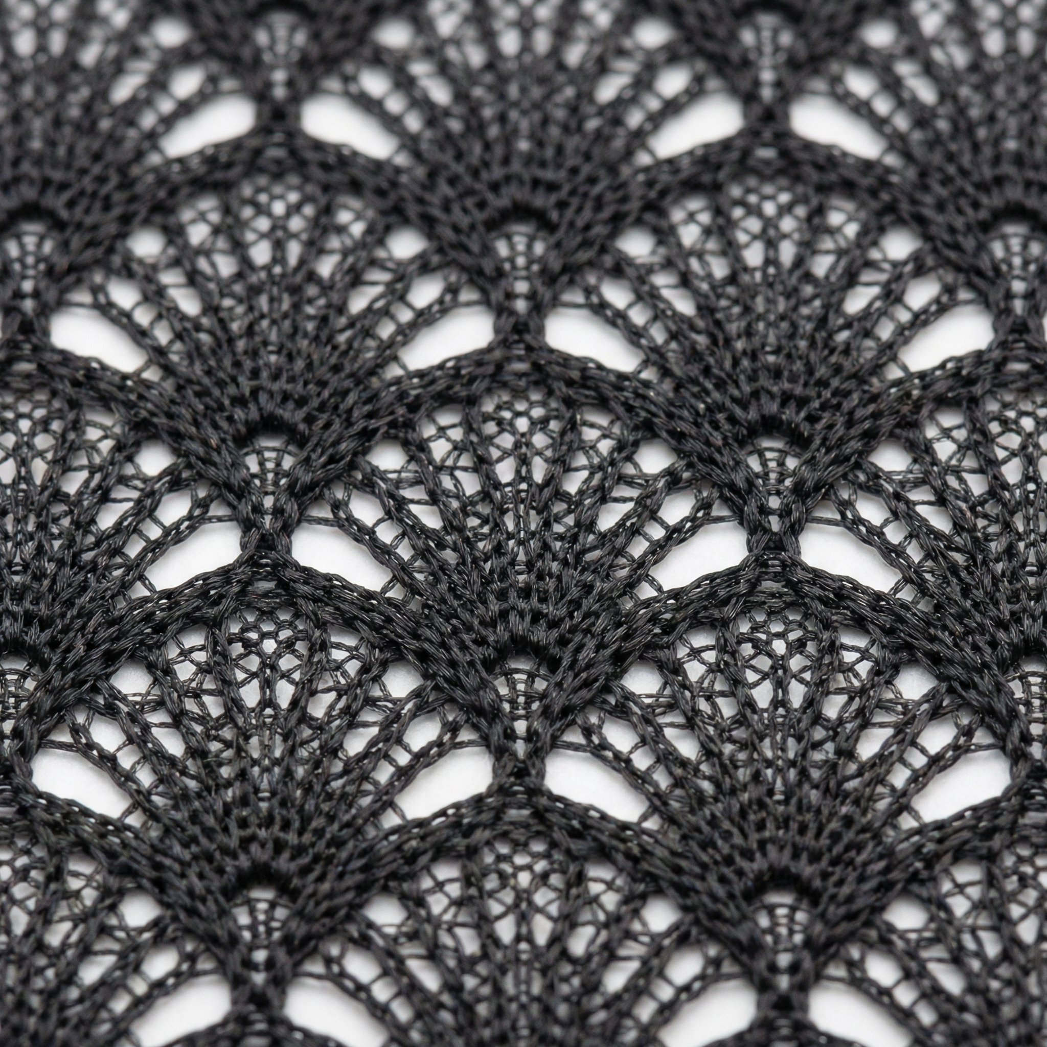 Fan-Pattern Black Mesh Fabric Macro