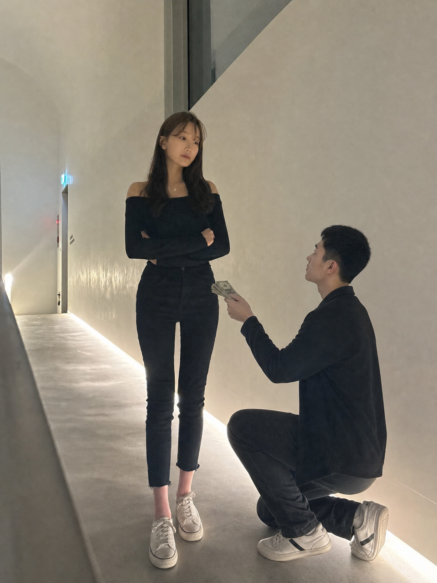 Man Kneeling and Offering Money