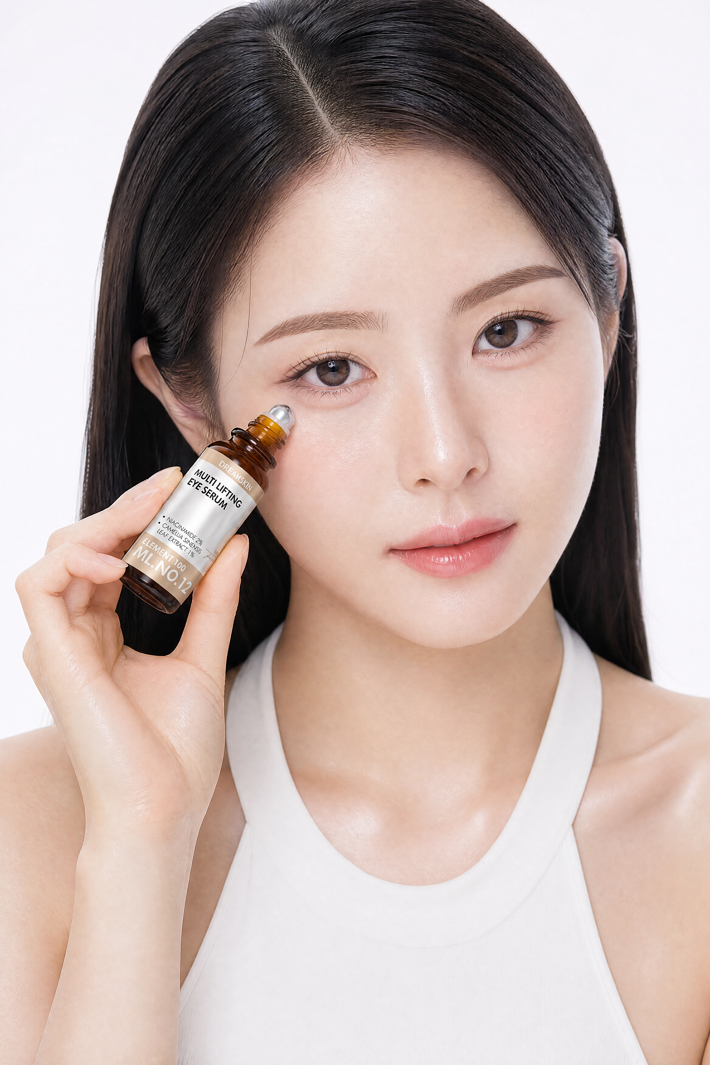 Korean Woman Applying Eye Serum