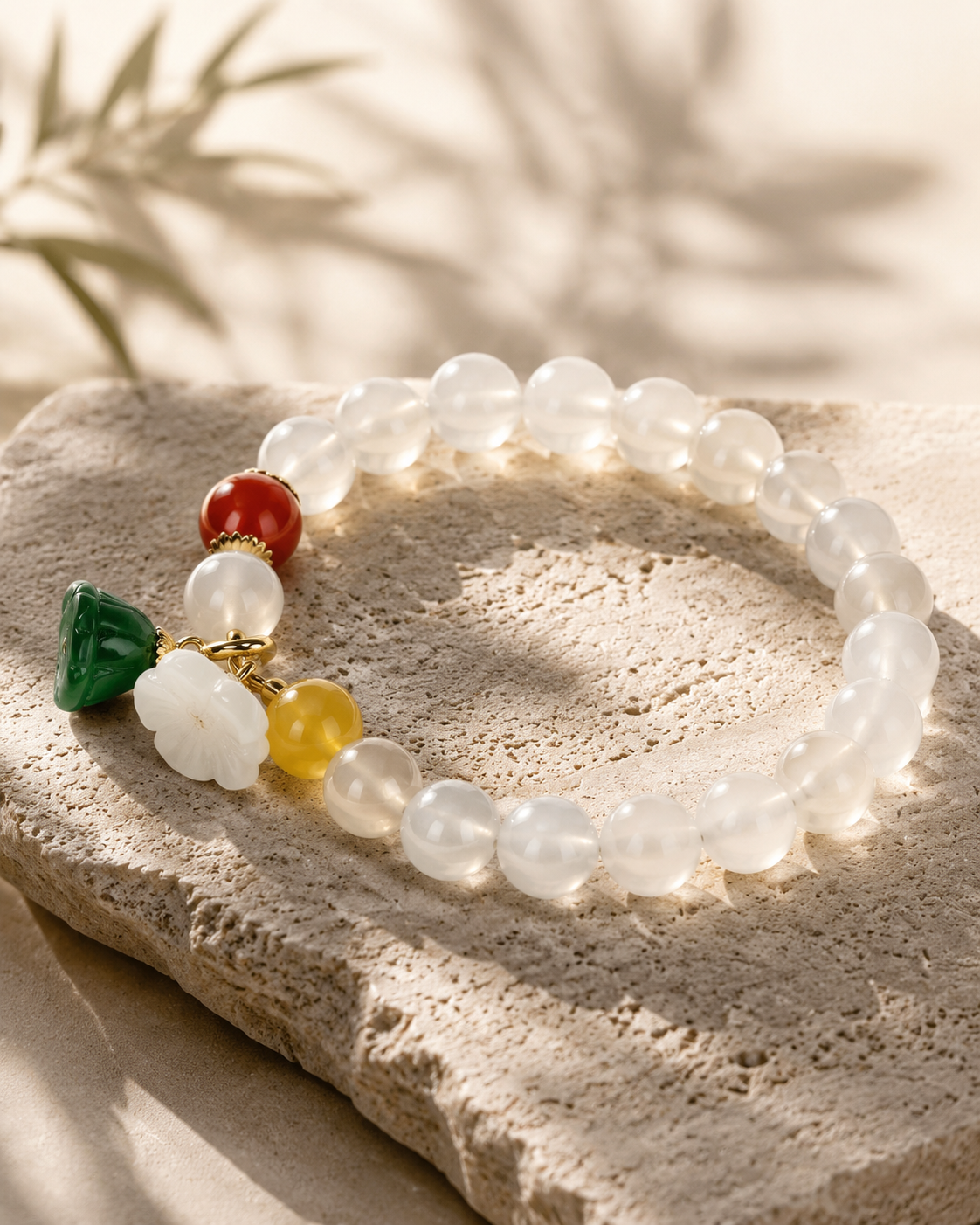 Agate and Jade Bracelet on Travertine