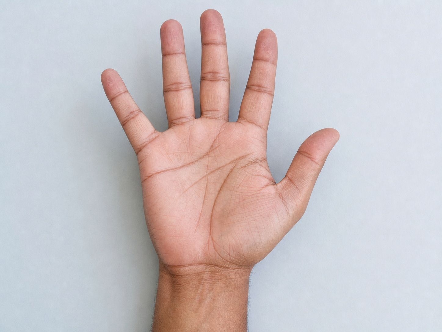 Clear open right palm on a plain background for AI palm reading
